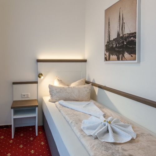 Dreibettzimmer